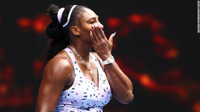 Serena Williams reacts after losing her third round match against Qiang Wang at the Australian Open.