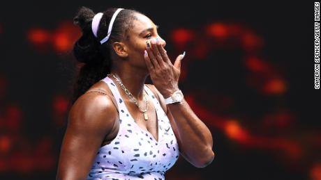Serena Williams reacts after losing her third round match against Qiang Wang at the Australian Open.