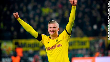 Dortmund&#39;s Norwegian forward Erling Braut Haaland celebrates scoring during the German first division Bundesliga football match Borussia Dortmund v FC Cologne in Dortmund, on January 24, 2020. (Photo by Ina FASSBENDER / AFP) / DFL REGULATIONS PROHIBIT ANY USE OF PHOTOGRAPHS AS IMAGE SEQUENCES AND/OR QUASI-VIDEO (Photo by INA FASSBENDER/AFP via Getty Images)