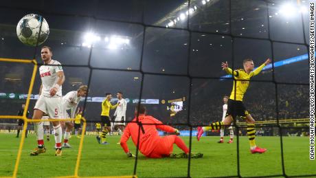 Håland celebrates after scoring  Dortmund&#39;s fourth goal against Koln.
