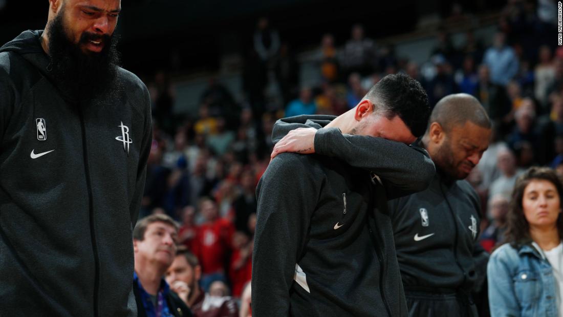 From left, Houston Rockets players Tyson Chandler, Austin Rivers and P.J. Tucker react during a tribute to Kobe Bryant before their game against the Denver Nuggets on Sunday, January 26.