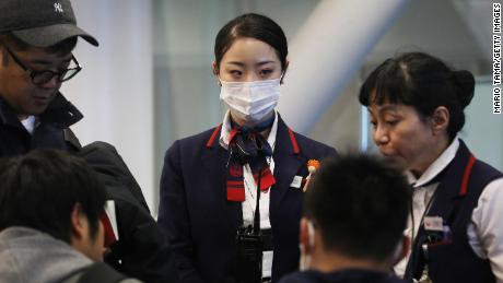 China warns coronavirus can spread before symptoms show