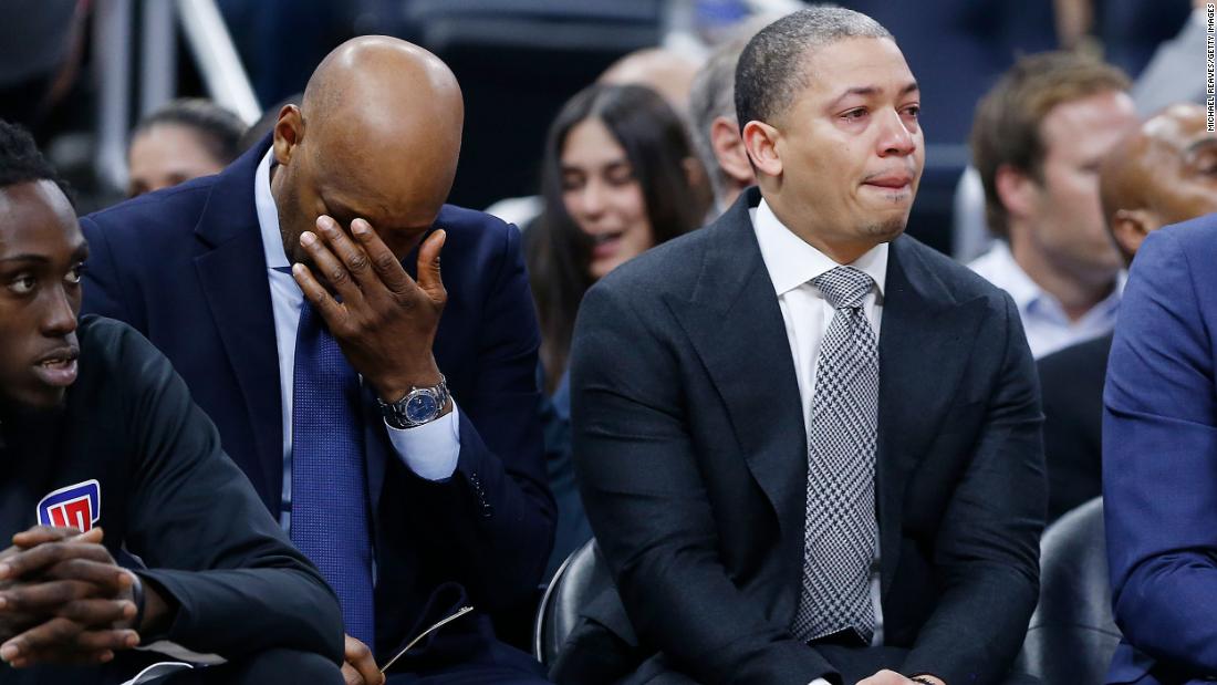 LA Clippers assistant coaches Sam Cassell and Tyronn Lue react on the bench after honoring Kobe Bryant during a game against the Orlando Magic at Amway Center in Orlando on Sunday.