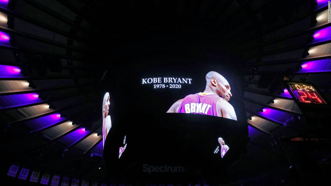 The ceiling of Madison Square Garden is lit in the colors of the Los Angeles Lakers as Bryant&#39;s picture is displayed during a moment of silence Sunday.