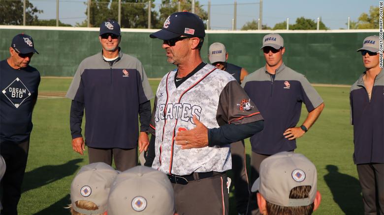 John Altobelli speaking to players