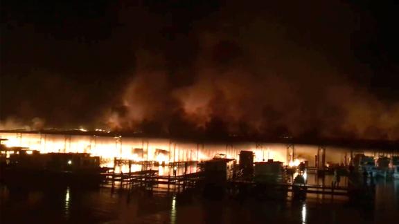 At least 8 people are dead after boats catch fire at an ...