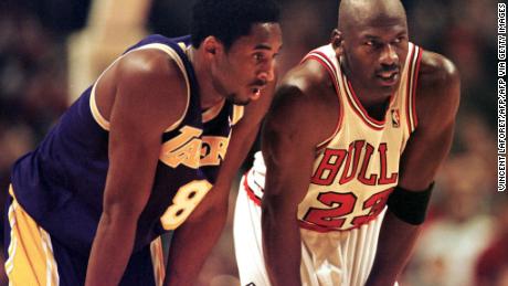 Bryant (L) modeled his basketball game after Michael Jordan, who he turned to for advice as a budding star and as a veteran facing retirement. 