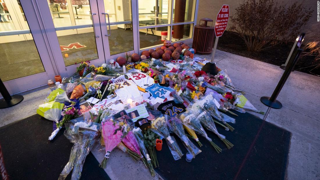 Flowers, jerseys and other memorabilia is left at the entrance of the Bryant Gymnasium at Lower Merion High School in Wynnewood, Pennsylvania, on January 27.