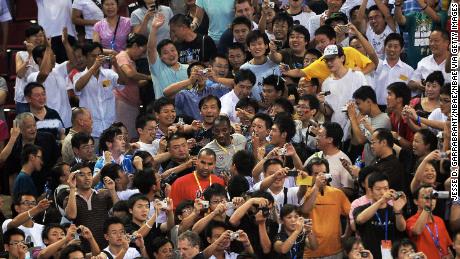 Kobe Bryant makes his way through the crowd of Chinese fans at the 2008 Beijing Olympics.