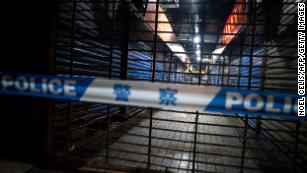 Members of staff of the Wuhan Hygiene Emergency Response Team conduct searches on the closed Huanan Seafood Wholesale Market in the city of Wuhan, in the Hubei Province, on January 11, 2020. 