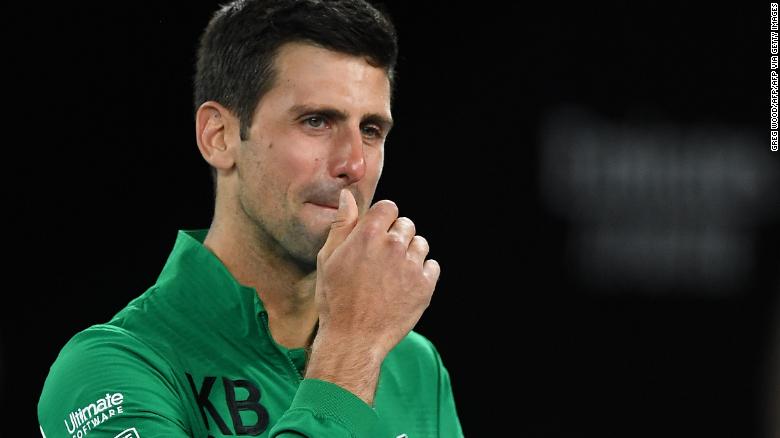 Serbia&#39;s Novak Djokovic gets emotional as he talks about Kobe Bryant after winning the men&#39;s singles quarter-final match against Canada&#39;s Milos Raonic on day nine of the Australian Open tennis tournament in Melbourne on January 28, 2020. (Photo by Greg Wood / AFP) / IMAGE RESTRICTED TO EDITORIAL USE - STRICTLY NO COMMERCIAL USE (Photo by GREG WOOD/AFP via Getty Images)