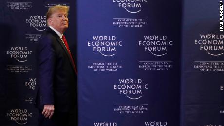 President Donald Trump leaves after a news conference at the World Economic Forum in Davos, Switzerland. 