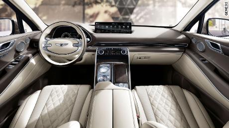 The Genesis GV80&#39;s interior has clean lines, quilted leather and wood trim.