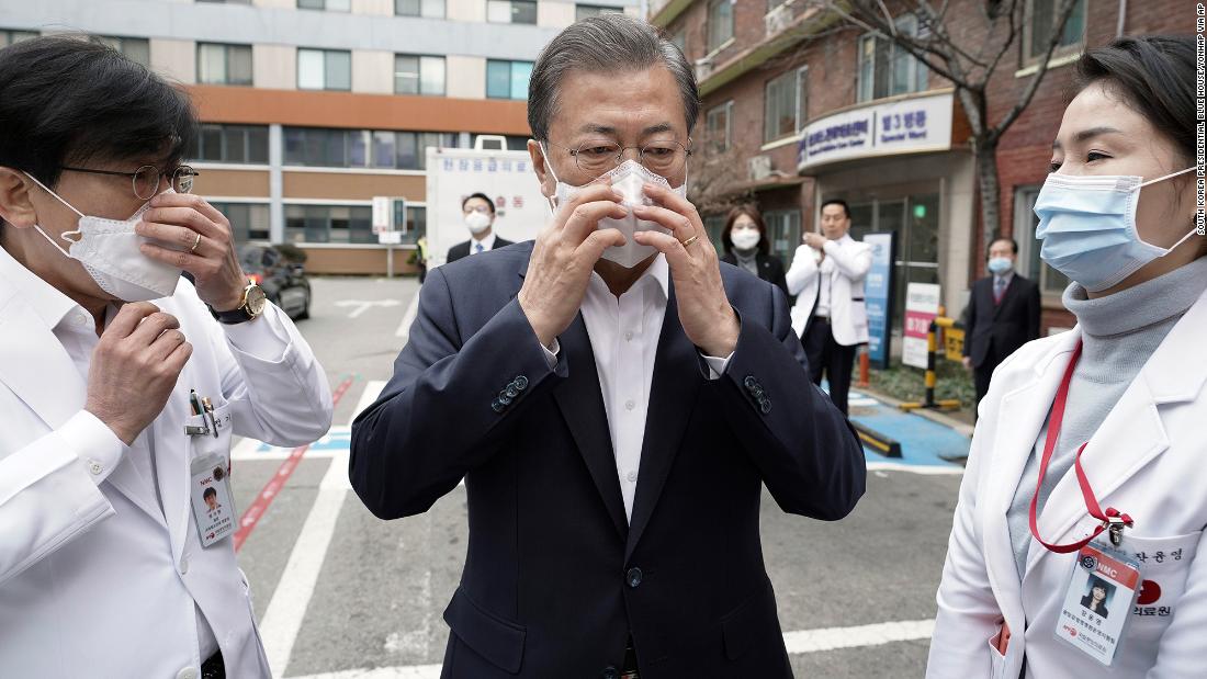 South Korean President Moon Jae-in wears a mask to inspect the National Medical Center in Seoul on January 28, 2020.