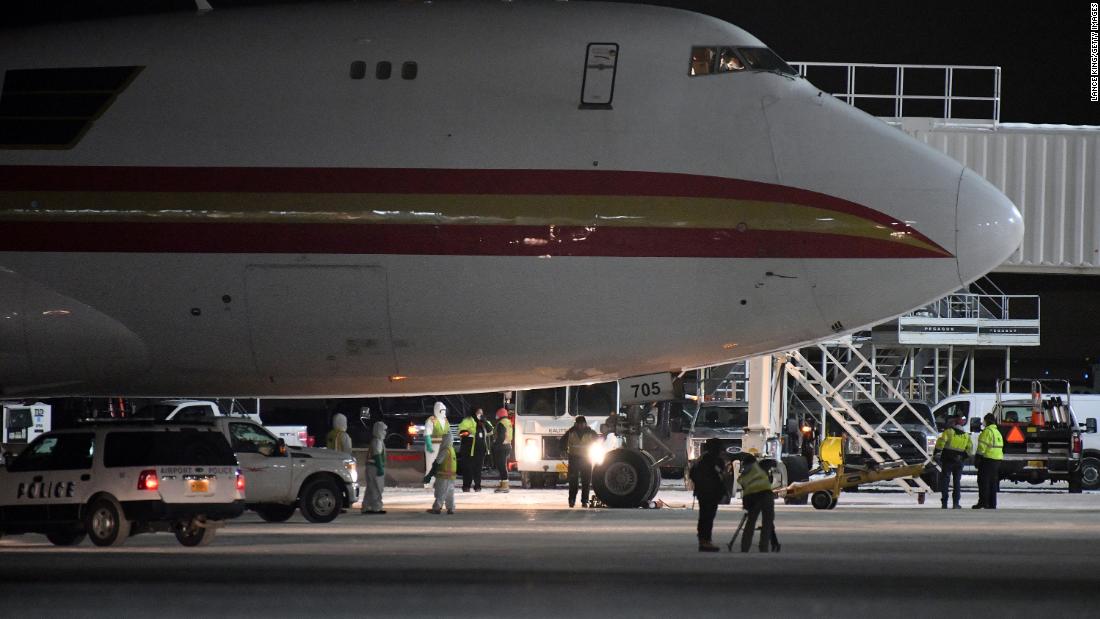 A charter flight from Wuhan arrives at an airport in Anchorage, Alaska, on January 28, 2020. The US government chartered the plane to bring home US citizens and diplomats from the American consulate in Wuhan.