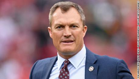 San Francisco 49ers general manager John Lynch walks on the field before their NFC Championship game against the Green Bay Packers at Levi&#39;s Stadium in Santa Clara, California.