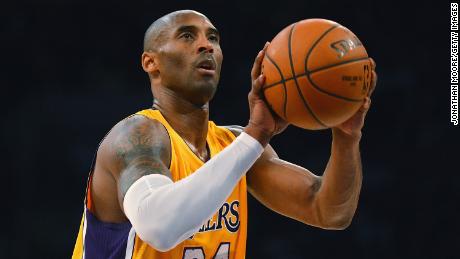 Kobe Bryant #24 of the Los Angeles Lakers shoots a free throw during a game.