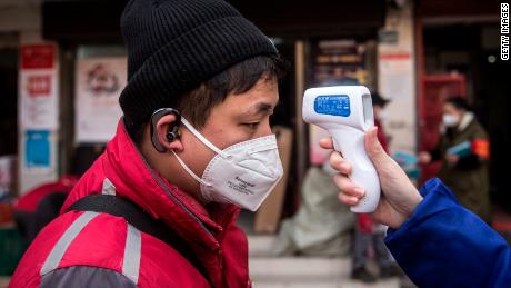 Wuhan coronavirus cases top 8,000 as countries step up evacuation efforts