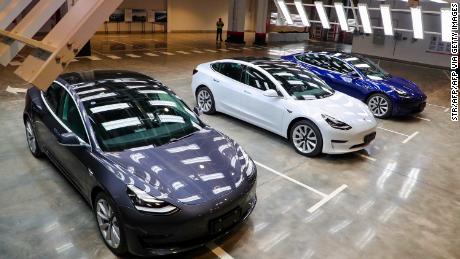 Tesla Model 3 cars are displayed during the Tesla China-made Model 3 Delivery Ceremony in Shanghai. - Tesla CEO Elon Musk presented the first batch of made-in-China cars to ordinary buyers on January 7, 2020 in a milestone for the company&#39;s new Shanghai &quot;giga-factory&quot;, but which comes as sales decelerate in the world&#39;s largest electric-vehicle market. (Photo by STR / AFP) / China OUT (Photo by STR/AFP via Getty Images)