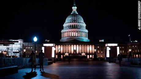 The Capitol in Washington is seen Thursday, Jan. 30, 2020, as the Senate continues to work into the evening on the impeachment trial of President Donald Trump on charges of abuse of power and obstruction of Congress. (AP Photo/J. Scott Applewhite)