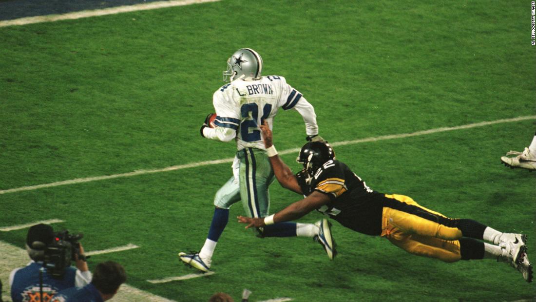 &lt;strong&gt;Super Bowl XXX (1996):&lt;/strong&gt; Dallas Cowboys cornerback Larry Brown is pushed out of bounds after one of his two interceptions in Super Bowl XXX. Brown&#39;s MVP efforts helped the Cowboys beat Pittsburgh 27-17 for their third championship in four years.