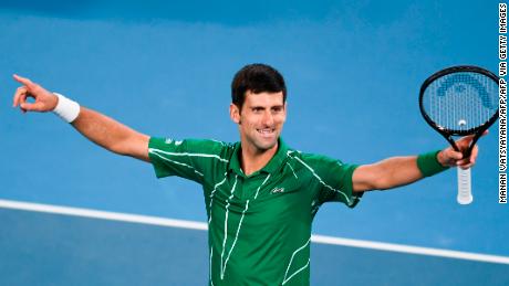 Novak Djokovic celebrates after victory against Austria&#39;s Dominic Thiem.