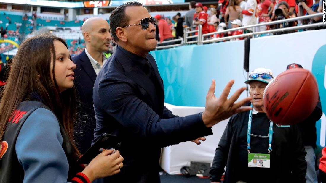 Former baseball star Alex Rodriguez tosses a football before the game. His girlfriend, Jennifer Lopez, performed during &lt;a href=&quot;http://www.cnn.com/2020/02/02/entertainment/gallery/super-bowl-halftime-show-photos/index.html&quot; target=&quot;_blank&quot;&gt;the halftime show.&lt;/a&gt;