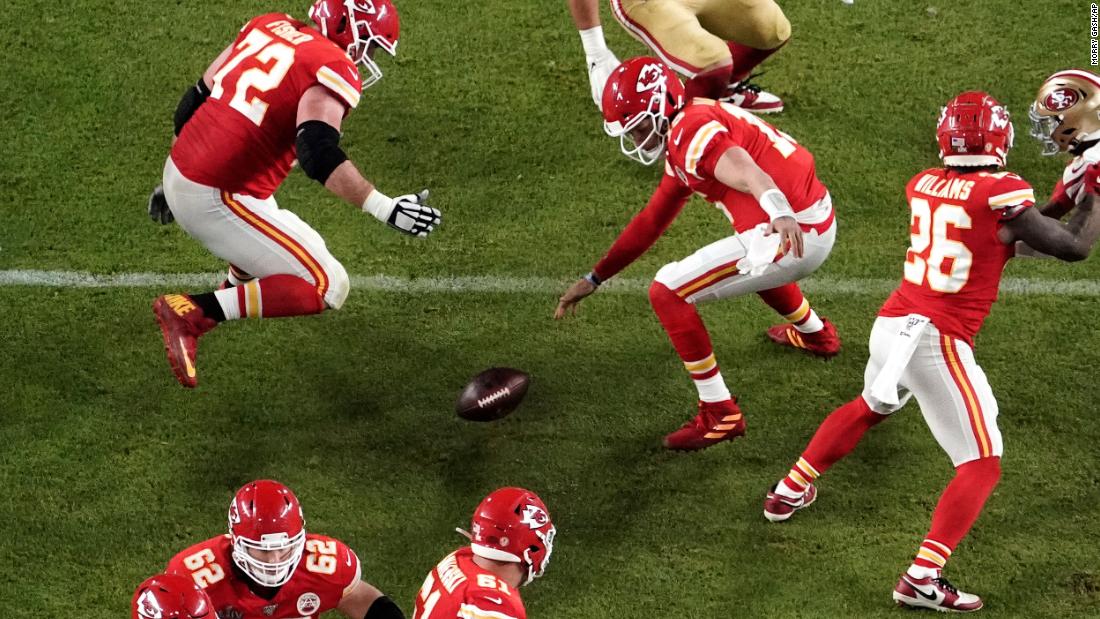 Mahomes looks for the ball after it was knocked out of his hands in the second half.