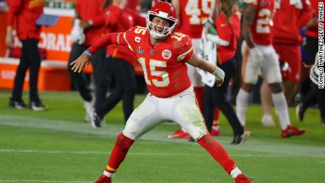 Patrick Mahomes celebrates after throwing a touchdown pass in the fourth quarter.