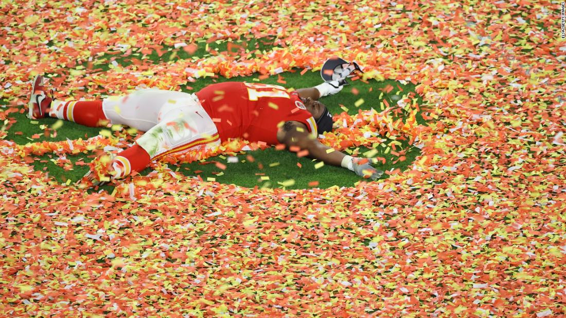 Kansas City&#39;s Derrick Nnadi makes a confetti angel after the game.