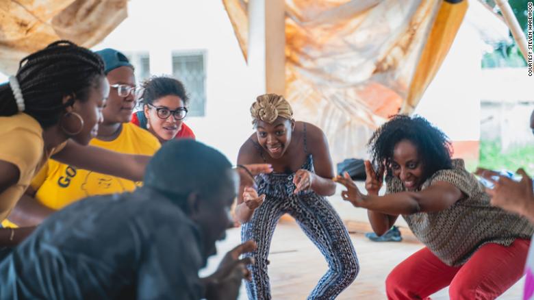 Scholars dancing with a professor from the University of Ghana&#39;s Performing Arts School in Accra, Ghana in 2018.