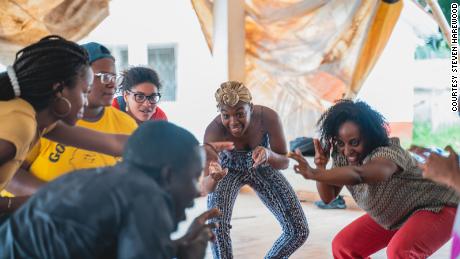 Scholars dancing with a professor from the University of Ghana&#39;s Performing Arts School in Accra, Ghana in 2018.