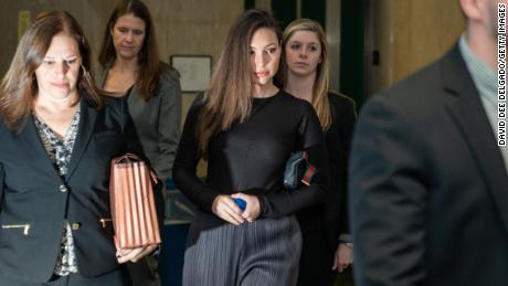 Jessica Mann (center) arrives at Manhattan criminal court to testify at the sex assault trial of Harvey Weinstein on January 31, 2020, in New York.