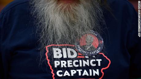 A Precinct Captain for Democratic Presidential candidate former Vice President Joe Biden prepares for the opening of the Iowa Caucus at Lincoln High School in Des Moines, Iowa.