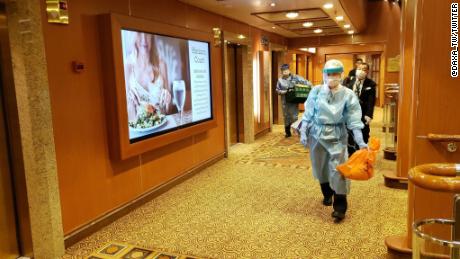 Health authorities were screening guests on the Diamond Princess Tuesday.