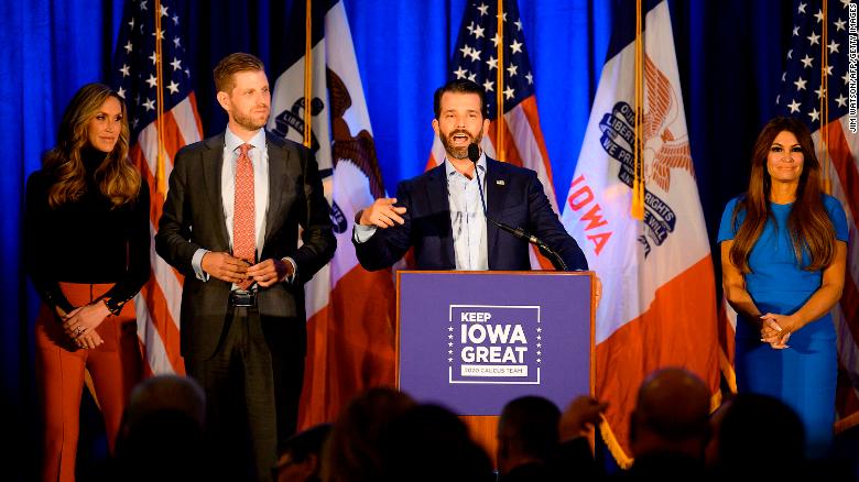Lara Trump (L), her husband Eric Trump (2L) and Kimberly Guilfoyle (R) listen to Donald Trump Jr. speak during a &quot;Keep Iowa Great&quot; press conference in Des Moines, Iowa, on February 3, 2020.