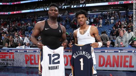 Williamson (left) and Morant swapped jerseys after the game.