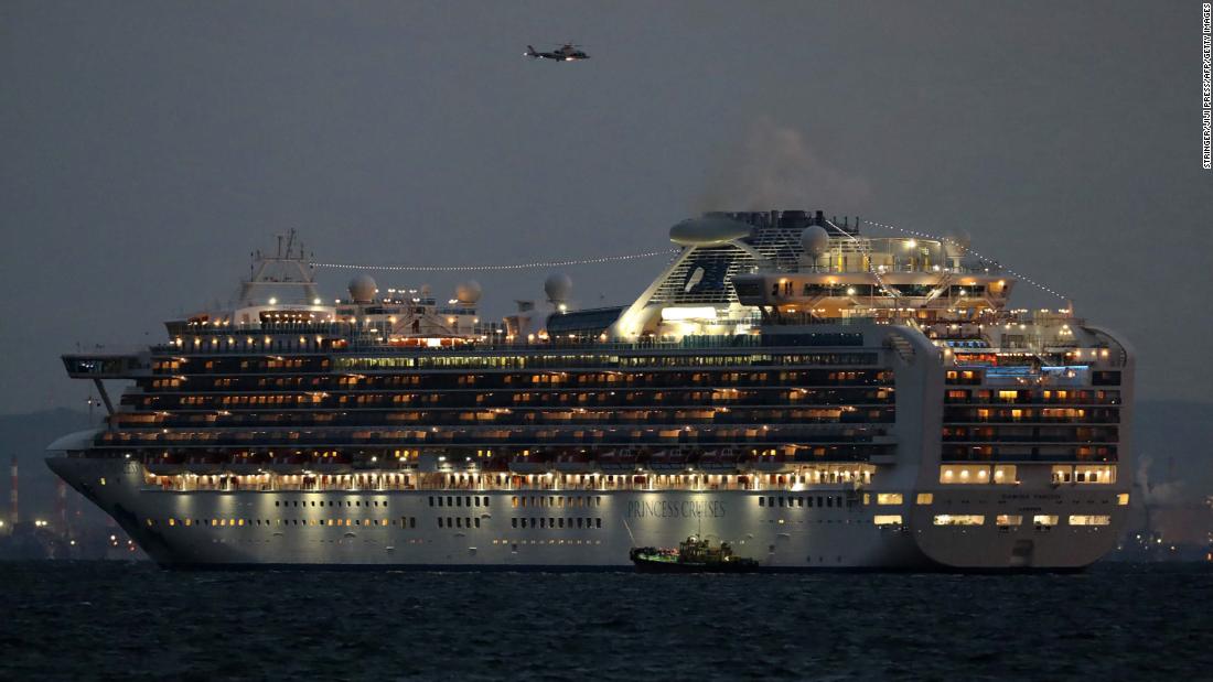 The Diamond Princess cruise ship sits anchored in quarantine off the port of Yokohama on February 4, 2020. It arrived a day earlier with passengers feeling ill.