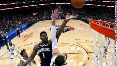 Zion Williamson #1 of the New Orleans Pelicans shoots over Jonas Valanciunas #17 of the Memphis Grizzlies during a NBA game at Smoothie King Center on January 31, 2020 in New Orleans, Louisiana. 