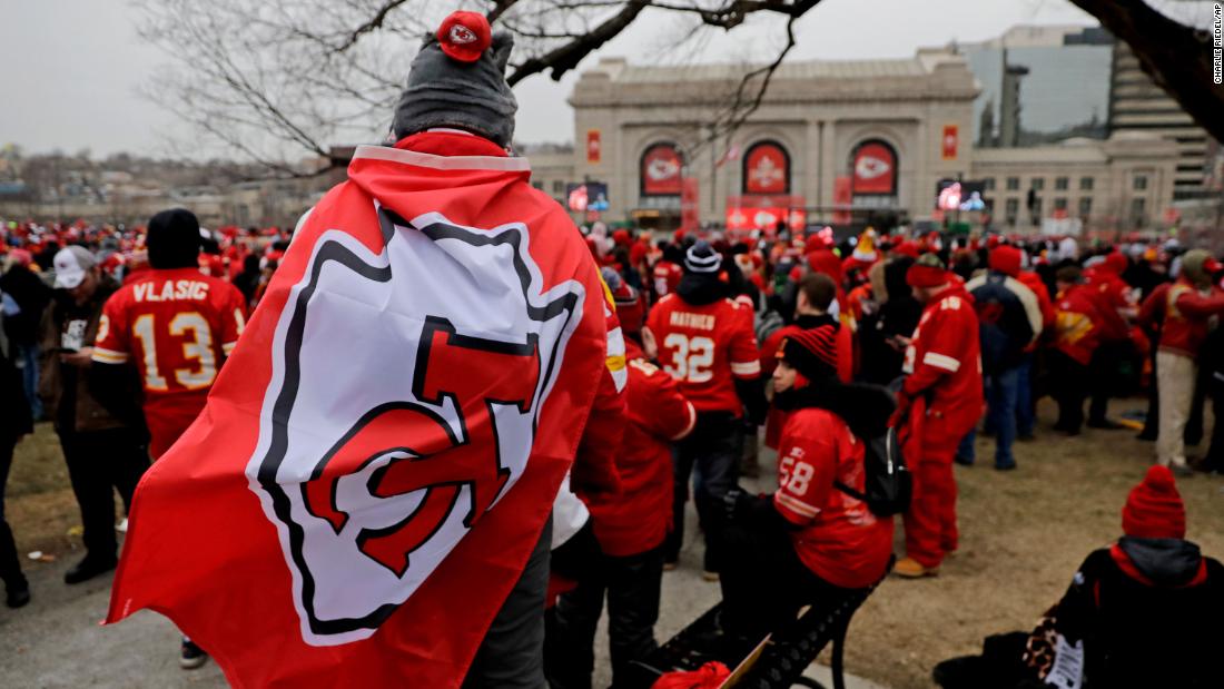 Fan watches Kansas City Chiefs' Super Bowl LIV victory parade from