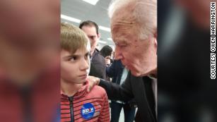 Democratic presidential candidate Joe Biden talks with 12-year-old Brayden.