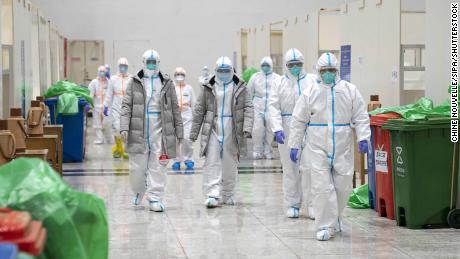 Medical staff are seen at a makeshift hospital converted from an exhibition center in Wuhan.