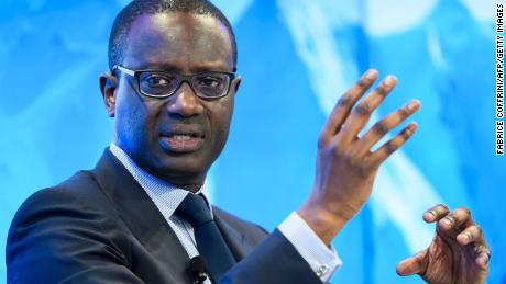 Credit Suisse&#39;s Chief Executive Officer (CEO) Tidjane Thiam gestures during a pannel &quot;Size Matters: The Future of Big Business&quot; on January 17, 2017 in Davos on the first day of the World Economic Forum.
The global elite begin a week of earnest debate and Alpine partying in the Swiss ski resort of Davos on January 17, 2017 in a week bookended by two presidential speeches of historic import. 