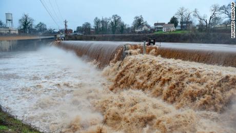 The Saluda River rages over a spillway after inches of rain fell in Pelzer, South Carolina, on Thursday, 