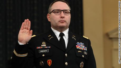 WASHINGTON, DC - NOVEMBER 19:  National Security Council Director for European Affairs Lt. Col. Alexander Vindman is sworn in to testify before the House Intelligence Committee in the Longworth House Office Building on Capitol Hill November 19, 2019 in Washington, DC. The committee heard testimony during the third day of open hearings in the impeachment inquiry against U.S. President Donald Trump, whom House Democrats say held back U.S. military aid for Ukraine while demanding it investigate his political rivals and the unfounded conspiracy theory that Ukrainians, not Russians, were behind the 2016 computer hacking of the Democratic National Committee.  (Photo by Chip Somodevilla/Getty Images)