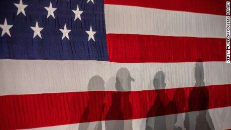 Voters attend a caucus night celebration in Des Moines.