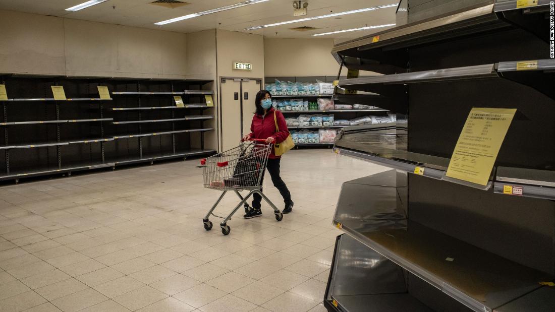 A shopper walks past empty shelves at a grocery store in Hong Kong on February 9, 2020. China&#39;s Ministry of Commerce &lt;a href=&quot;https://www.cnn.com/2020/02/06/asia/wuhan-coronavirus-update-intl-hnk/index.html&quot; target=&quot;_blank&quot;&gt;encouraged supermarkets and grocery stores&lt;/a&gt; to resume operations as the country&#39;s voluntary or mandatory quarantines began to take an economic toll. 