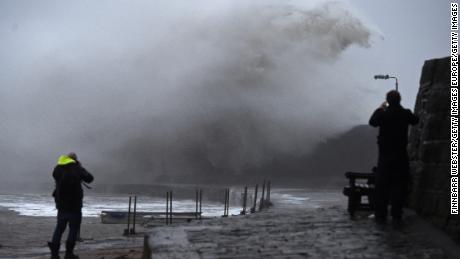 Storm Ciara causes large waves in Lyme Regis, in southwestern England, on Sunday.