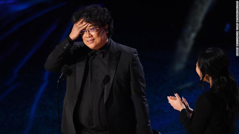Bong Joon-ho accepts the award for achievement in directing for &quot;Parasite&quot; - Robert Deutsch-USA TODAY