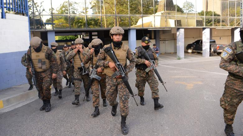 Soldiers outside the Legislative Assembly on Sunday.